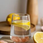 Close-up of the pink salt trick for weight loss drink in a glass