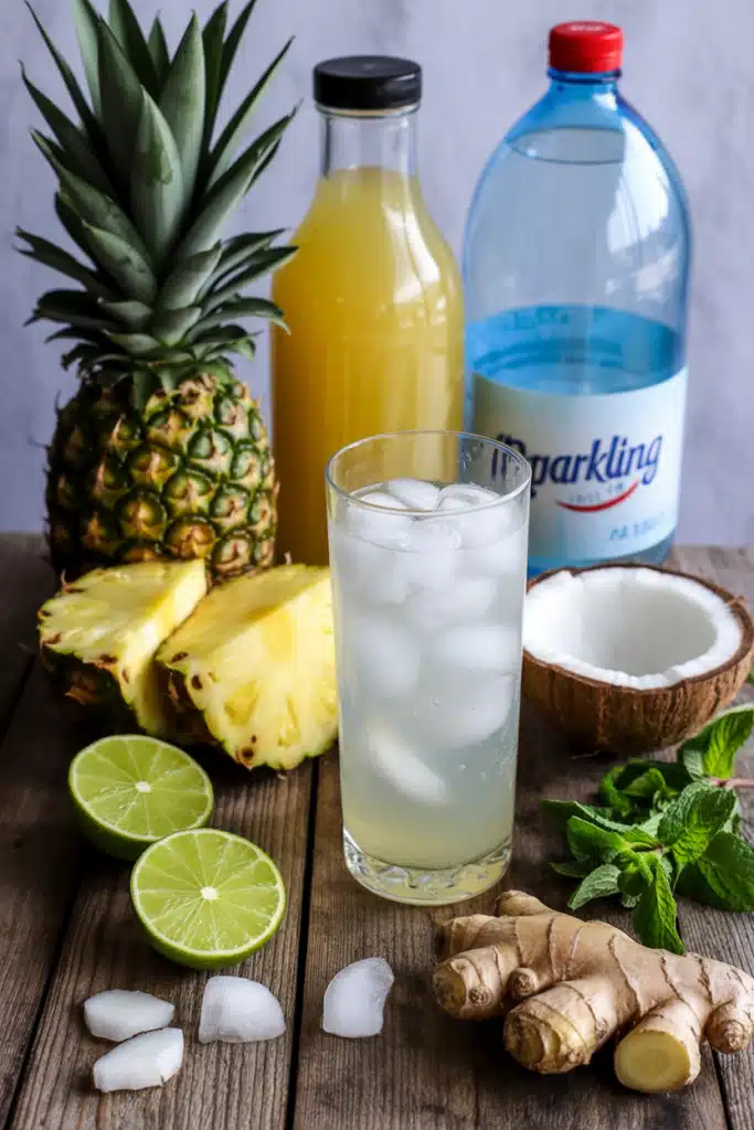 Pineapple Mocktail ingredients styled on rustic table