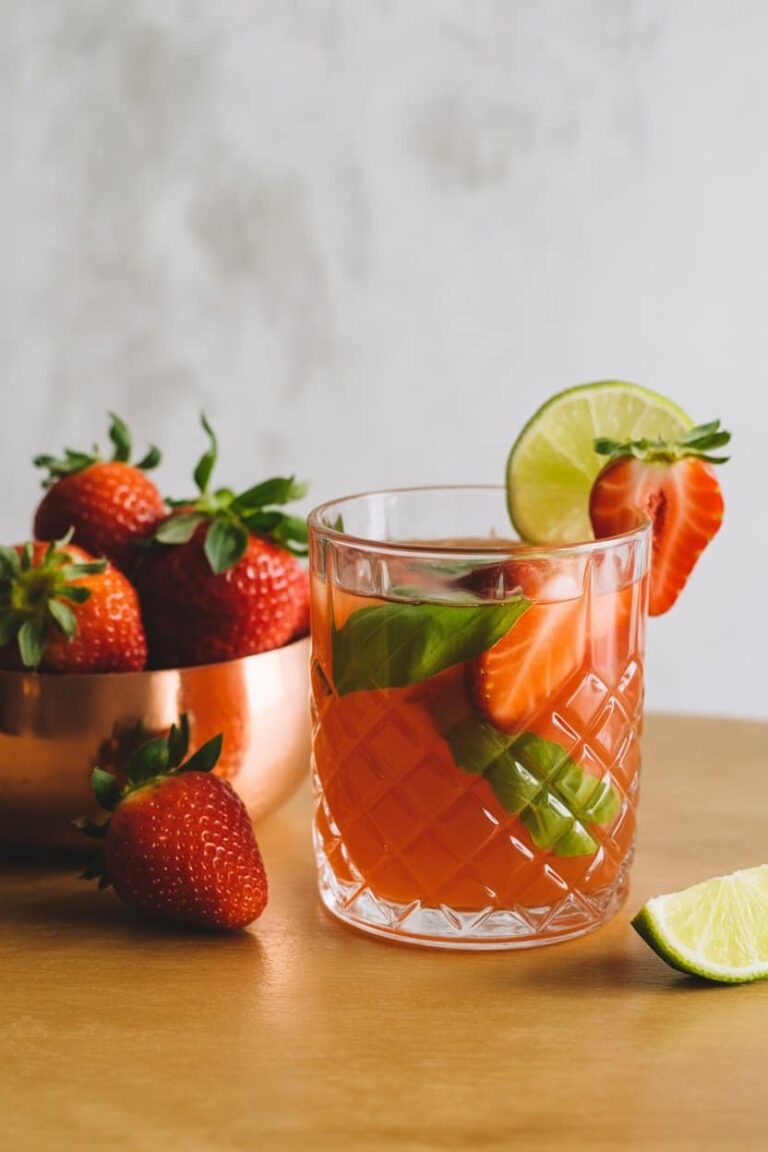 Close-up strawberry basil mocktail with basil garnish
